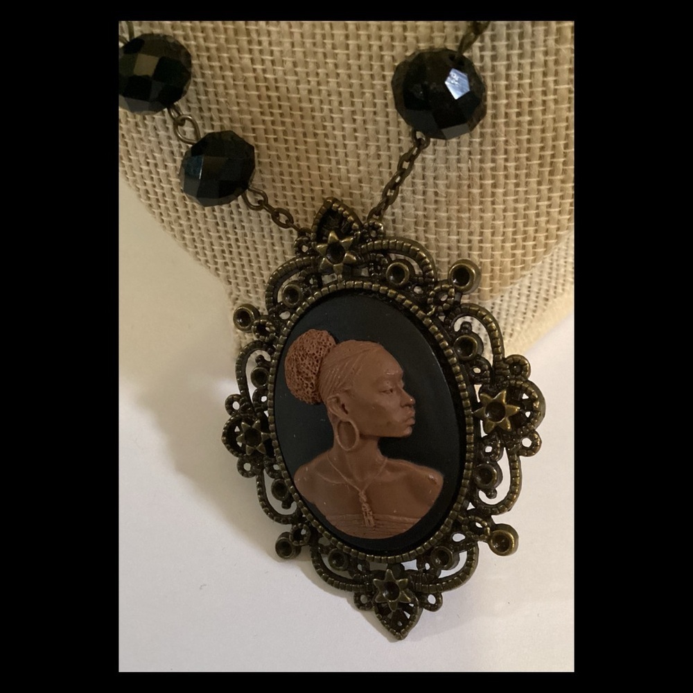 Black and brown lady cameo.